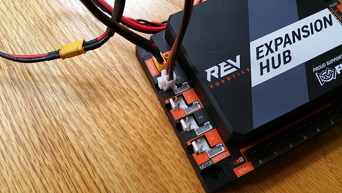 Shows the JST VH white connector of the cable plugged into the Control Hub