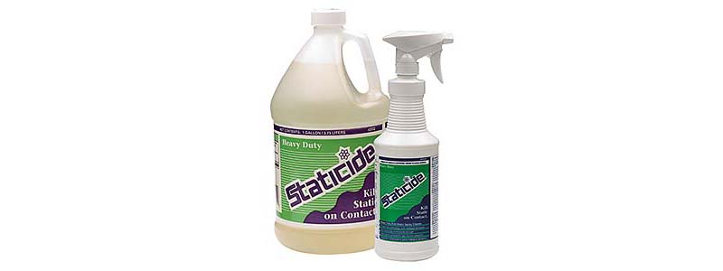 A gallon jug and a quart spray bottle of ACL Heavy Duty Staticide.